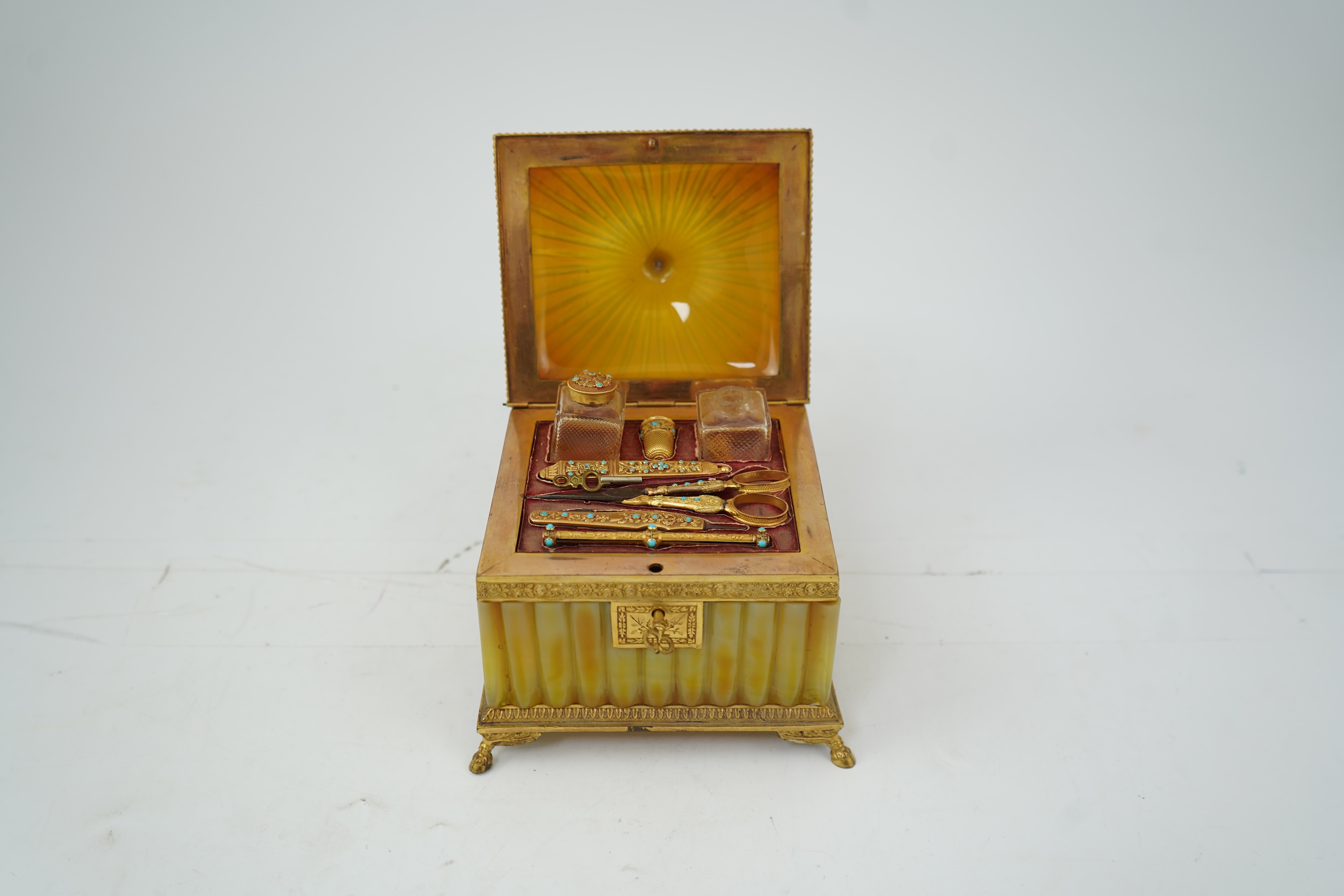 A mid 19th century French opaline glass necessaire box with turquoise and gold mounted accessories
